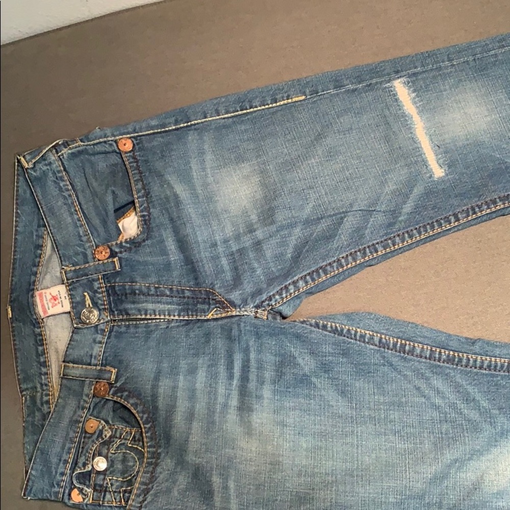Mens TruReligion jeans row 34 seat 33. Medium wash
